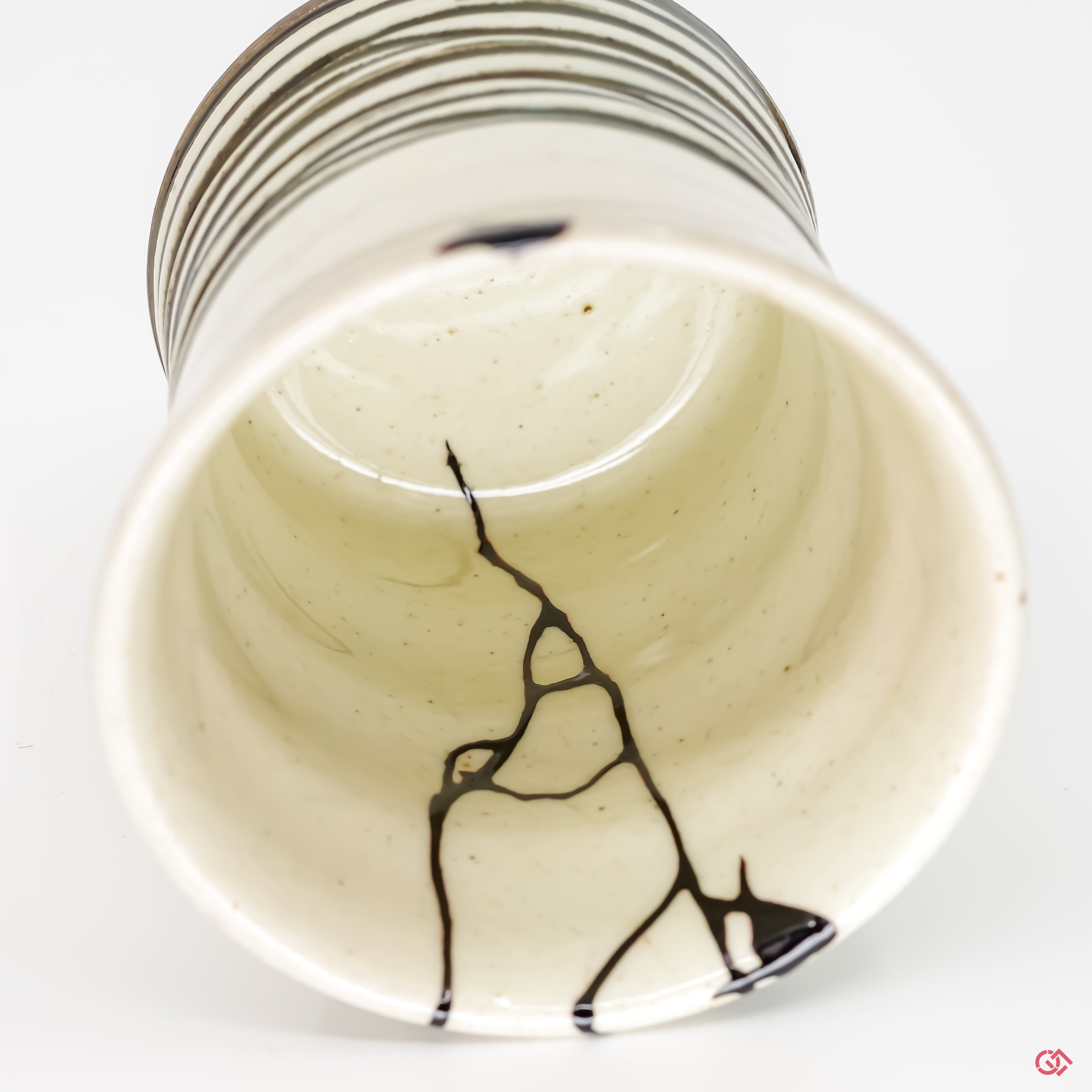 Up-close look at authentic Kintsugi pottery, highlighting intricate details.