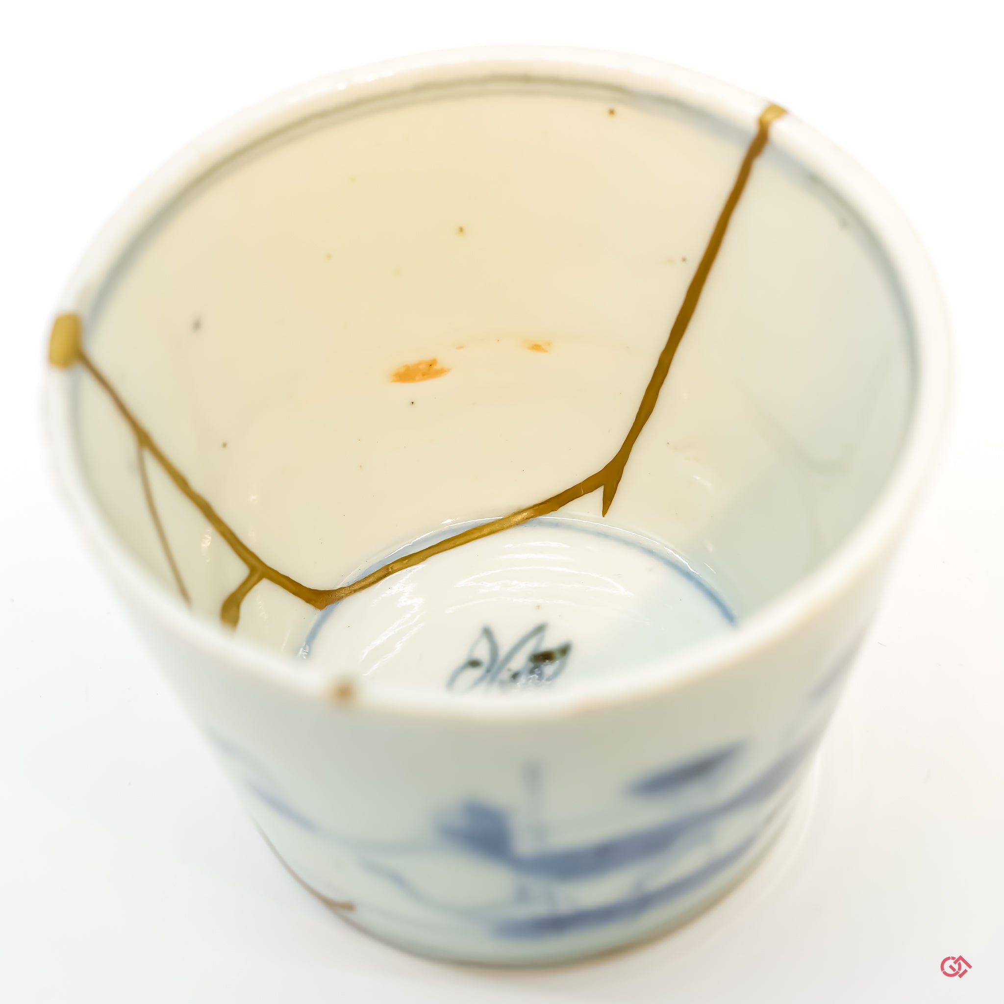 Discover the beauty of Kintsugi: Close-up of hand-repaired pottery.