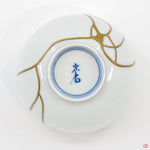 Photo of the bottom side of an authentic Kintsugi pottery, showing its overall design and features
