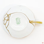 Photo of the bottom side of an authentic Kintsugi pottery piece, showing its overall design and features