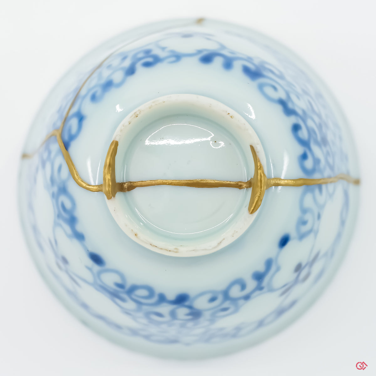 Underside view of authentic Kintsugi pottery, showcasing repair details and craftsmanship.
