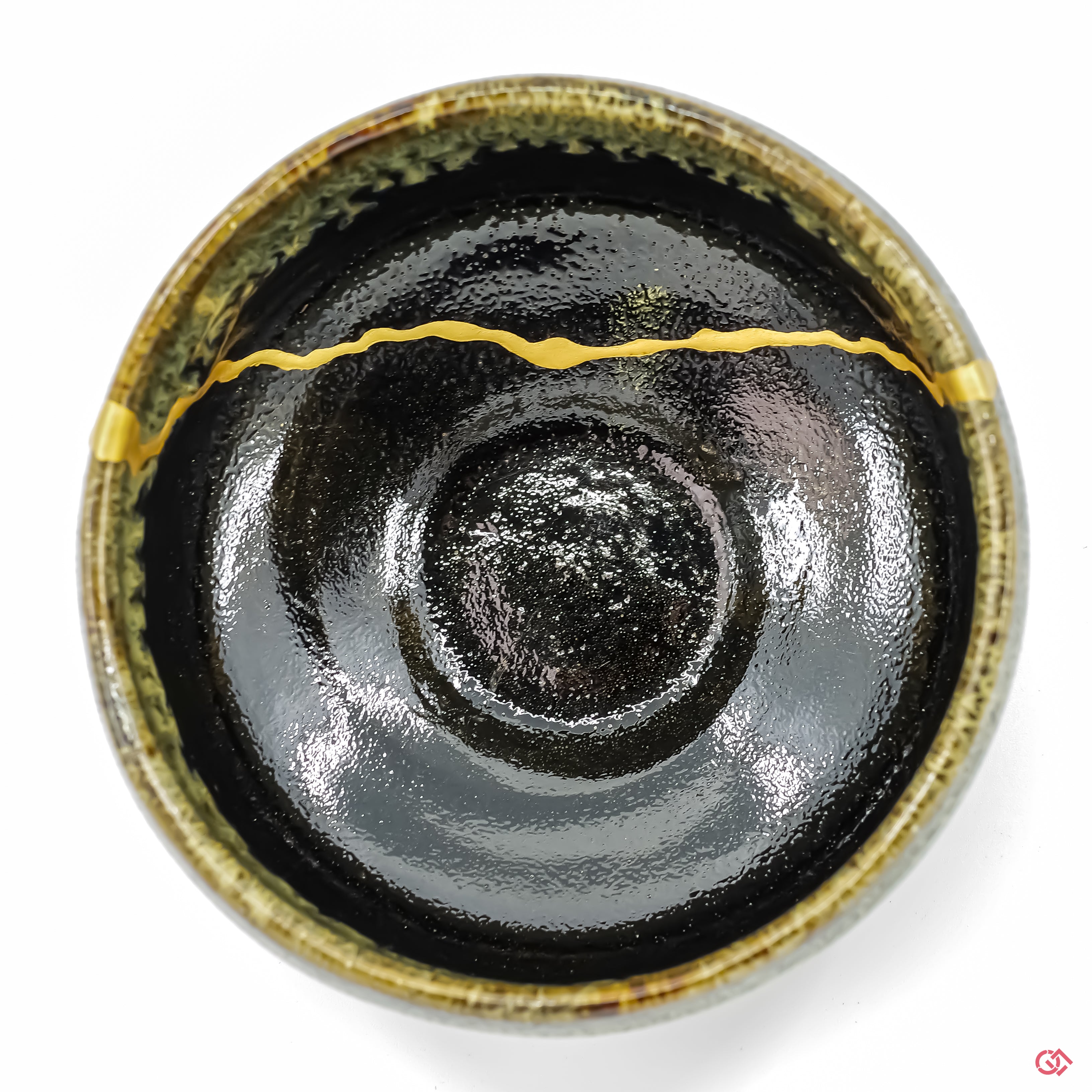 Top view of handcrafted Kintsugi pottery, showcasing design and craftsmanship.