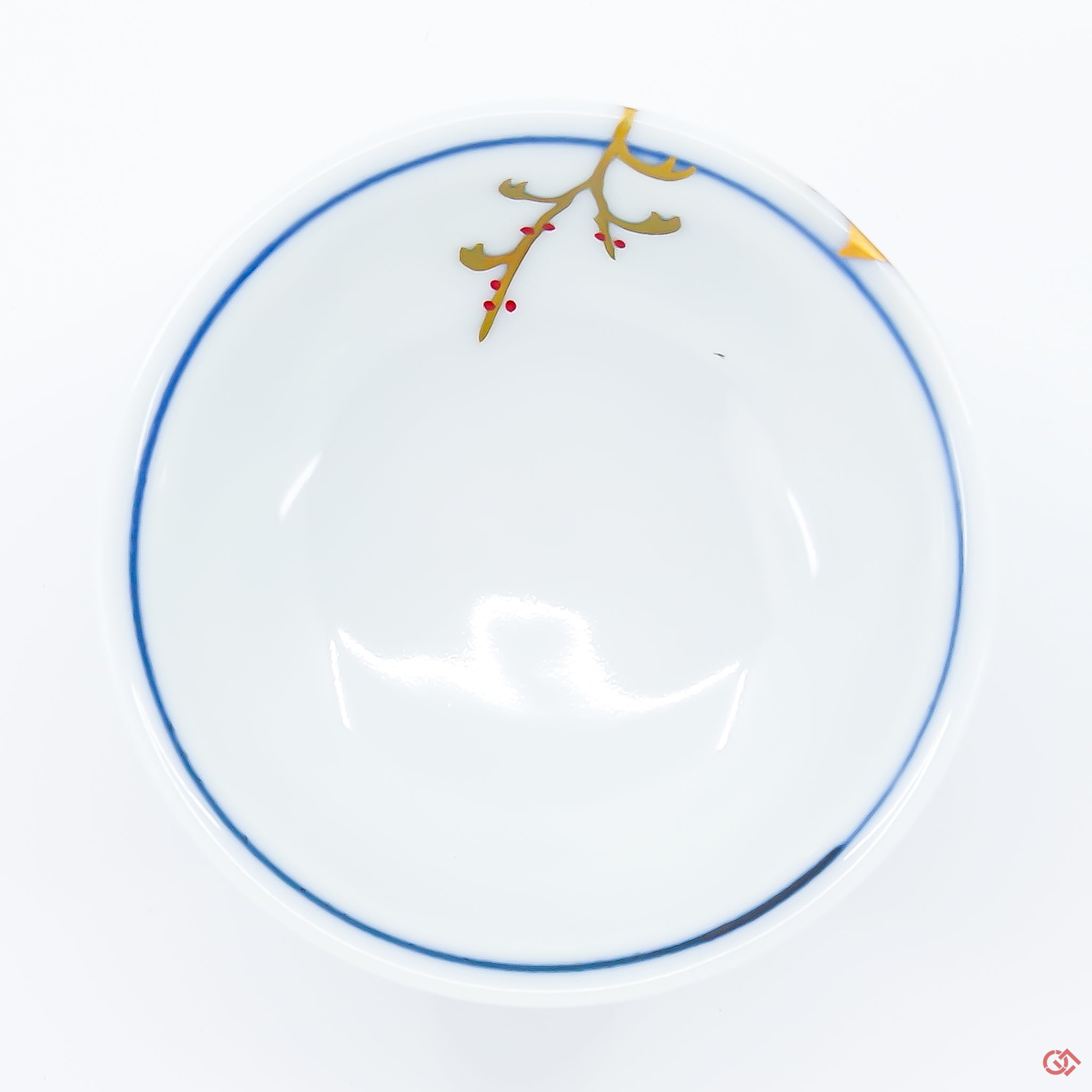 Photo of the top side of an authentic Kintsugi pottery piece, showing its overall design and features