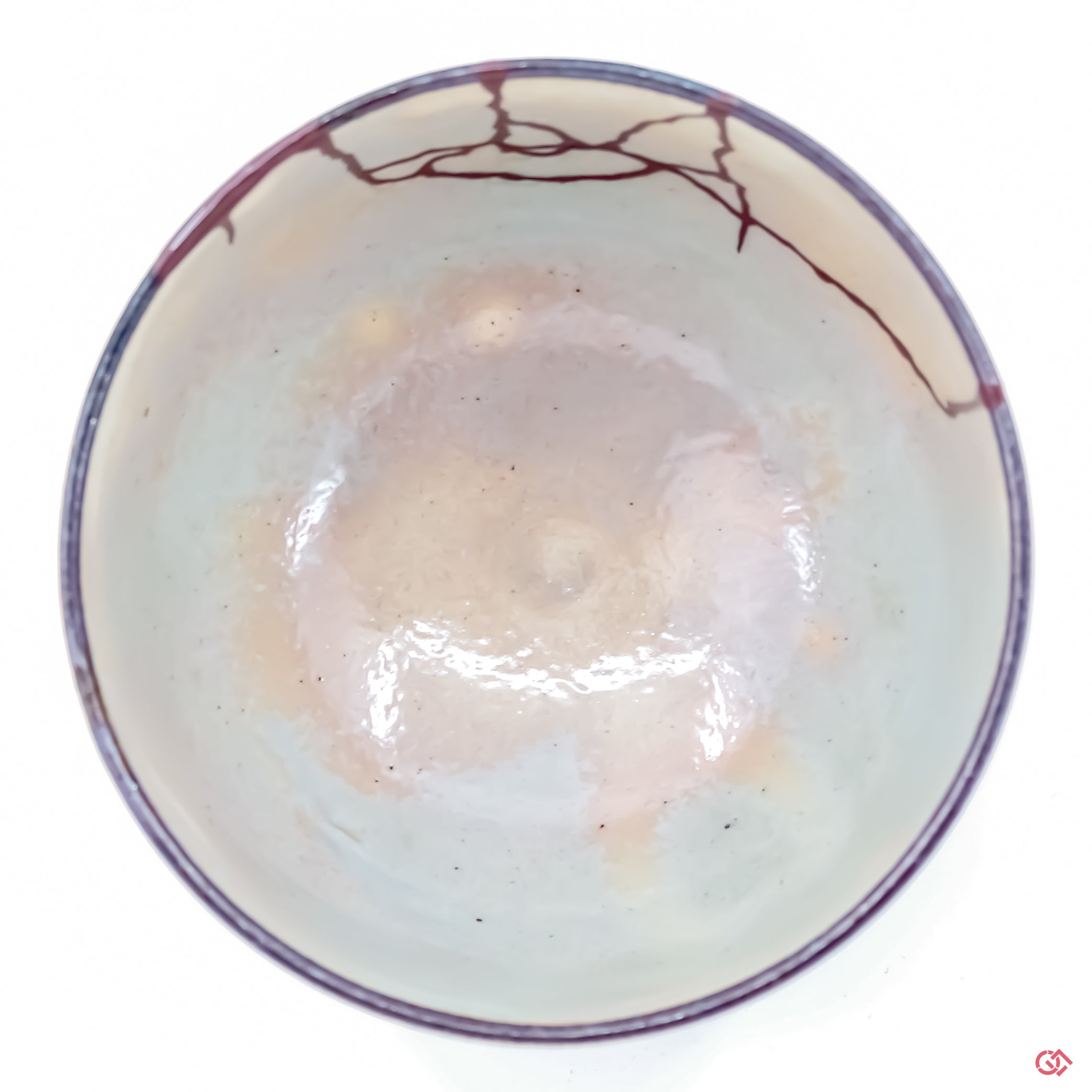 Discover the full beauty of Kintsugi: Top view of repaired pottery.