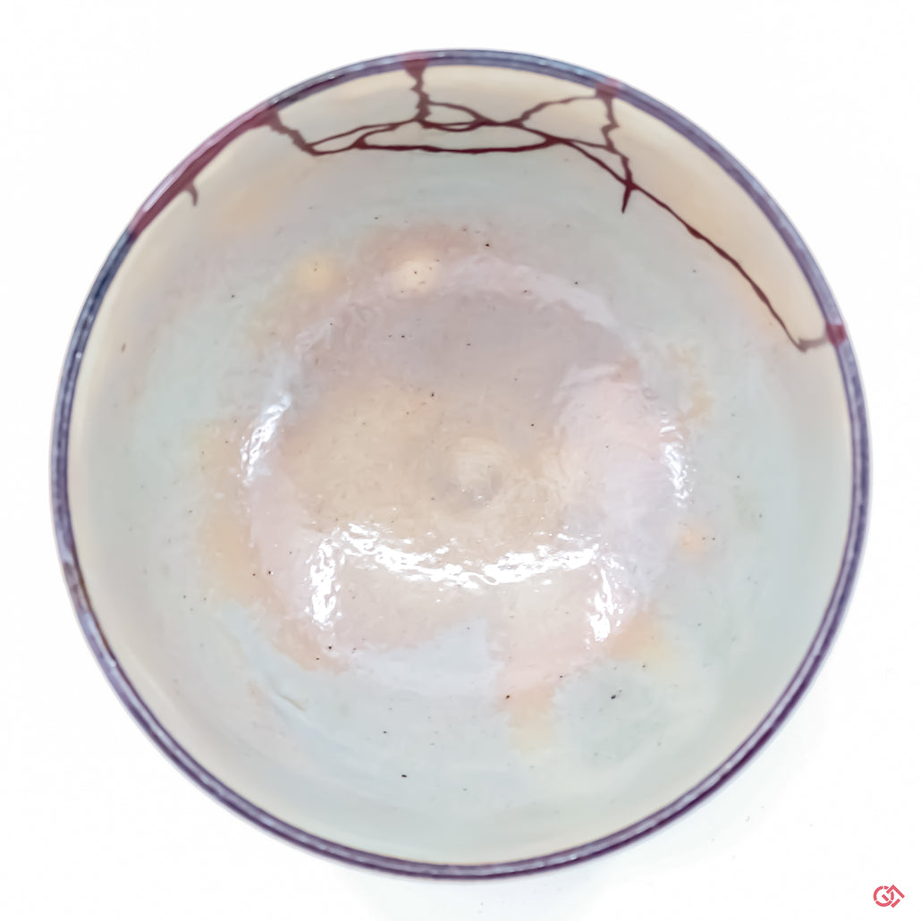 Discover the full beauty of Kintsugi: Top view of repaired pottery.