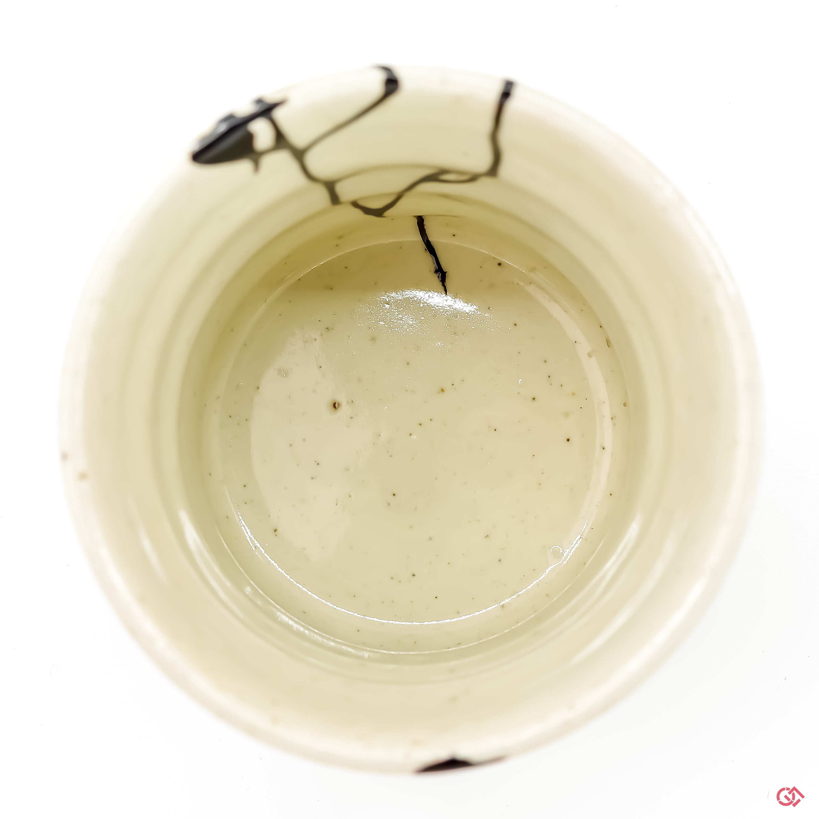 Explore the artistry of authentic Kintsugi: Top view of unique, repaired pottery.