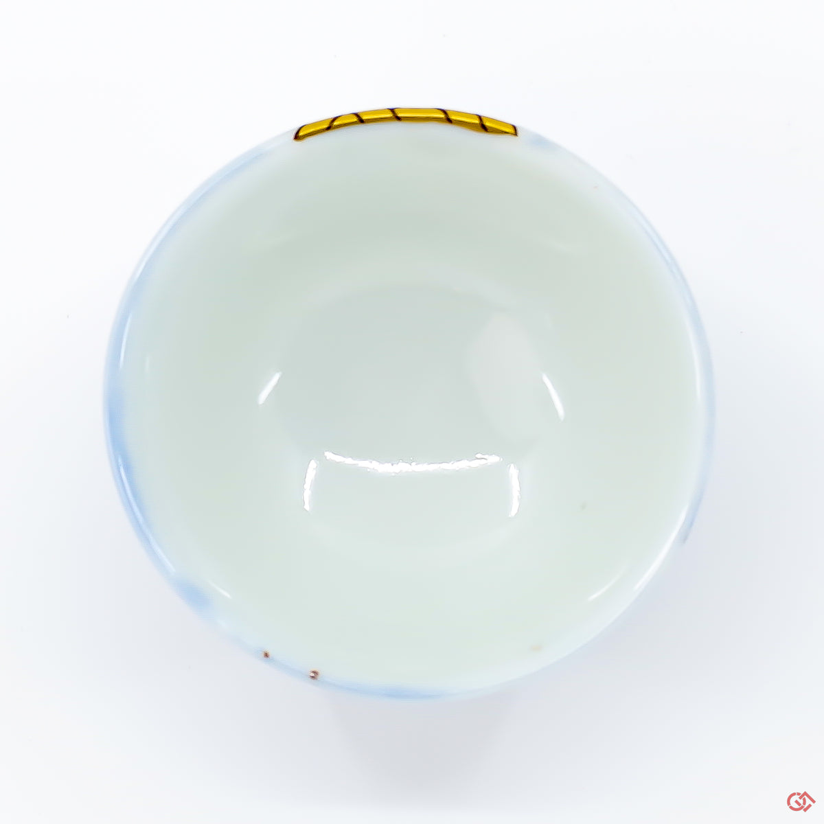 Photo of the top side of an authentic Kintsugi pottery piece, showing its overall design and features
