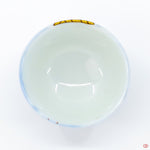 Photo of the top side of an authentic Kintsugi pottery piece, showing its overall design and features