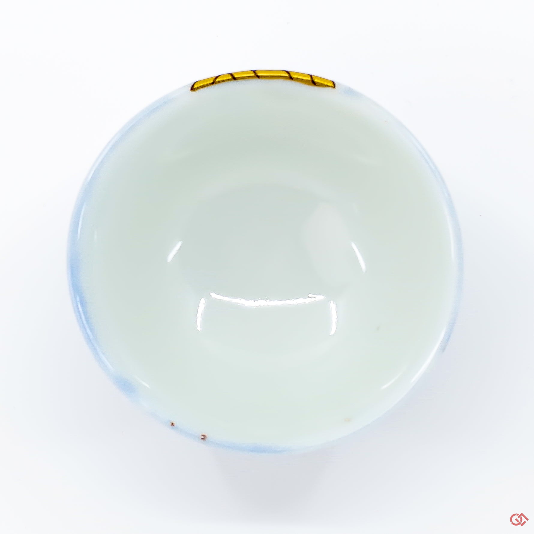 Photo of the top side of an authentic Kintsugi pottery piece, showing its overall design and features