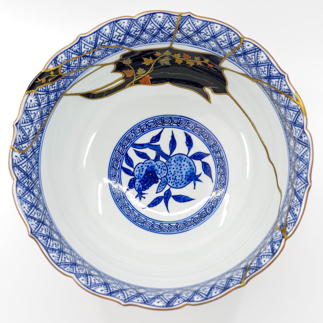 Explore the artistry of authentic Kintsugi: Top view of unique, repaired pottery.