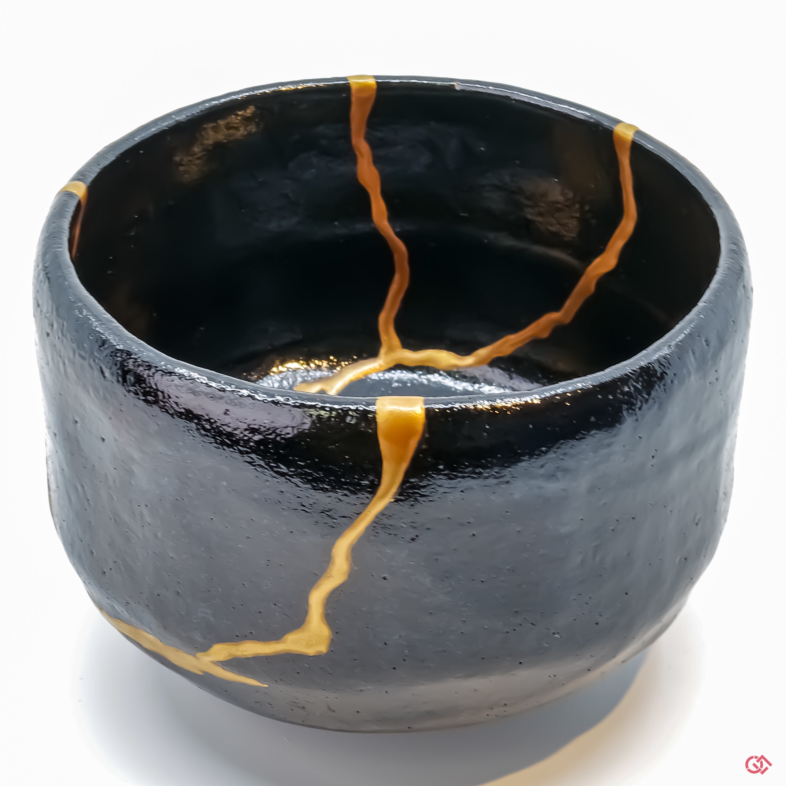 Up-close look at authentic Kintsugi pottery, highlighting intricate details.