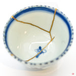 Close-up of authentic Kintsugi pottery repair.