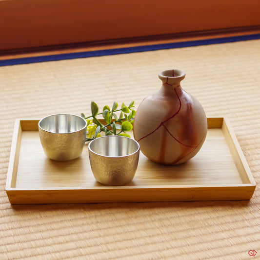 A photo of an authentic Kintsugi pottery piece being used in a real-world setting.