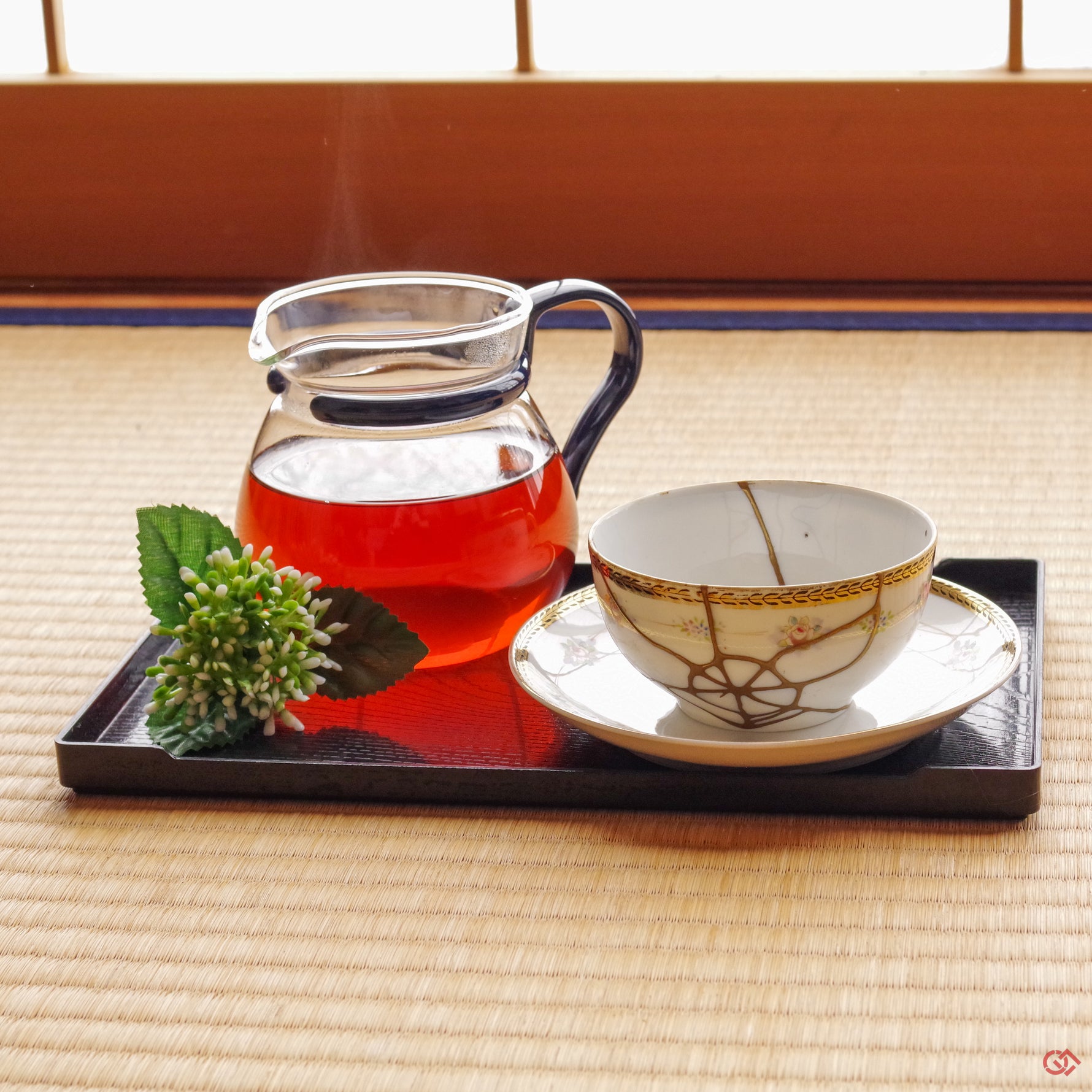 Photo of an authentic Kintsugi pottery piece being used in a real-world setting