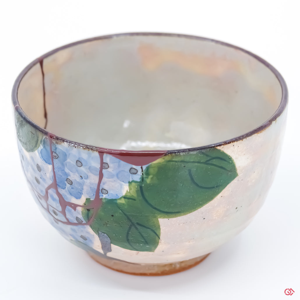 Up-close look at authentic Kintsugi pottery, highlighting intricate details.