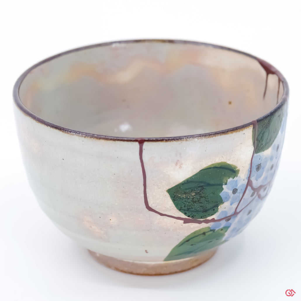 Discover the beauty of Kintsugi: Close-up of hand-repaired pottery.