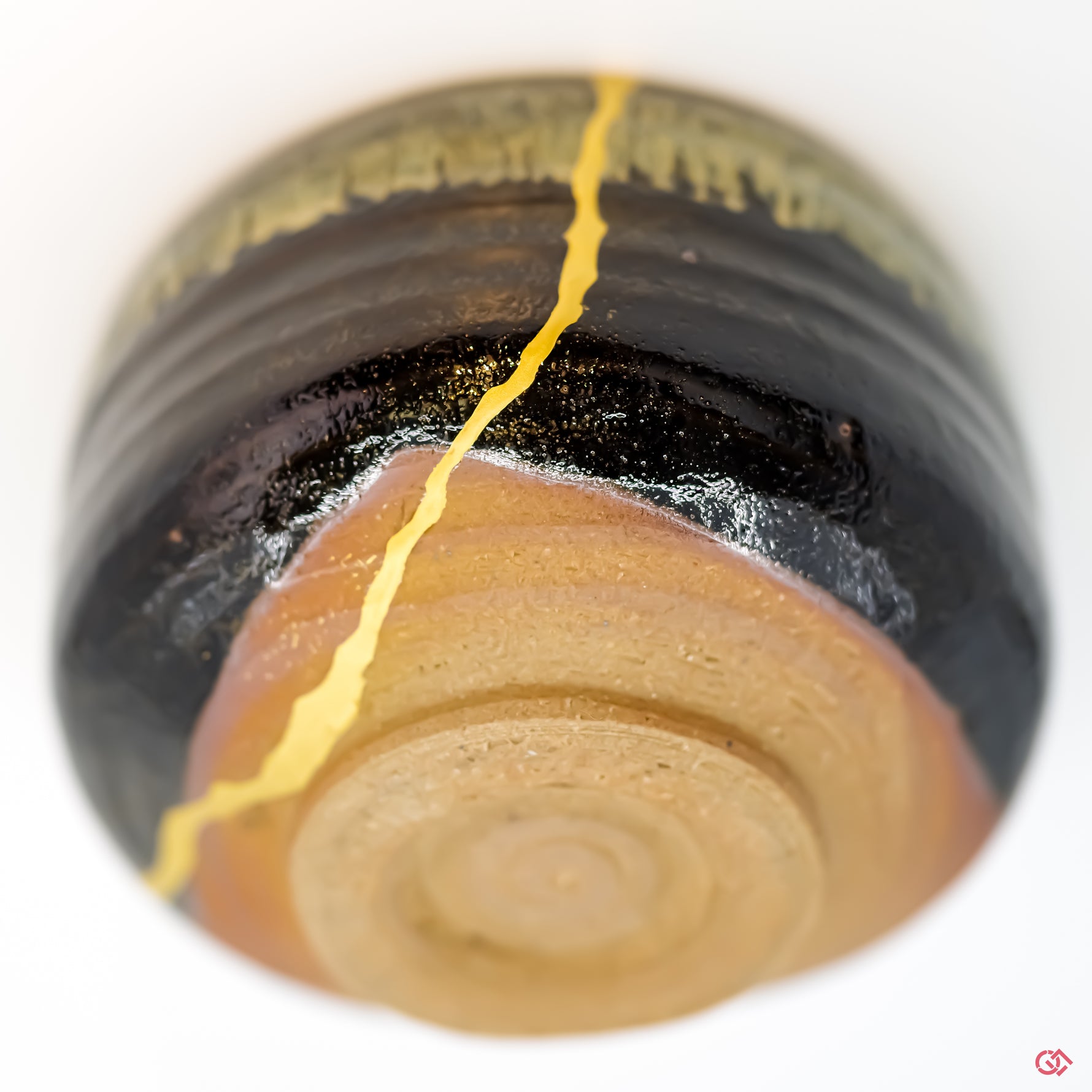 Discover the beauty of Kintsugi: Close-up of hand-repaired pottery.