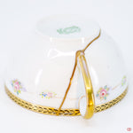 Close-up photo of an authentic Kintsugi pottery piece, showing the detail of its repairs and craftsmanship