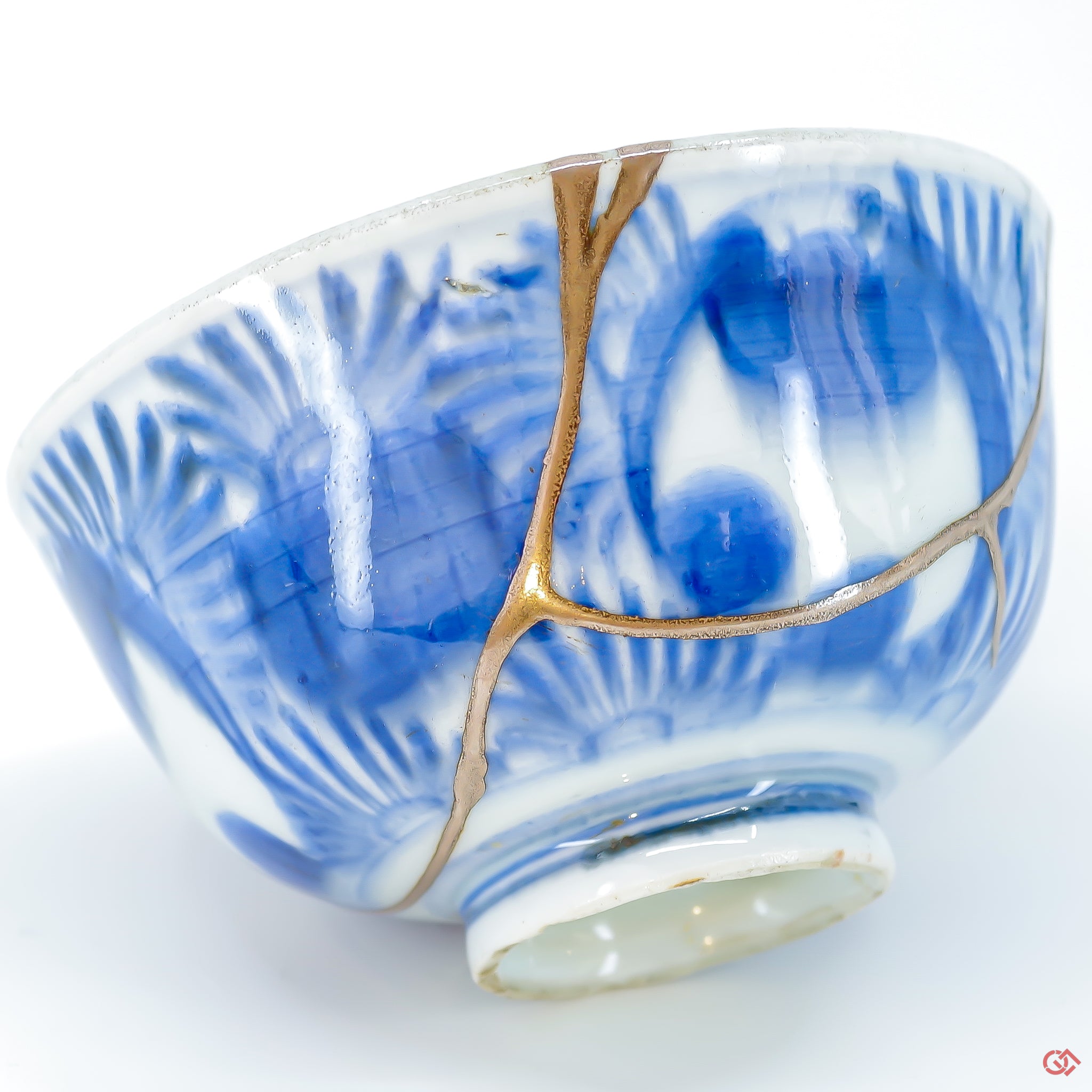 A close-up photo of an authentic Kintsugi pottery piece, showing the detail of its repairs and artisty. craftsmanship.
