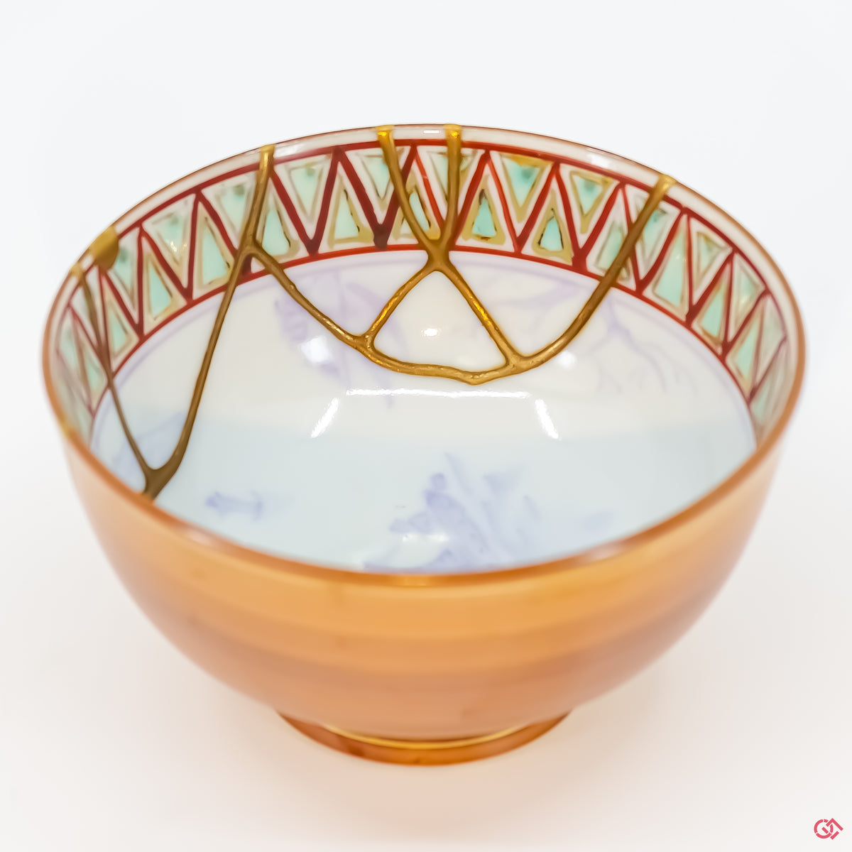 Buy the Japanese art of Kintsugi up close: Witness the delicate brushstrokes of gold that transform imperfection into beauty.