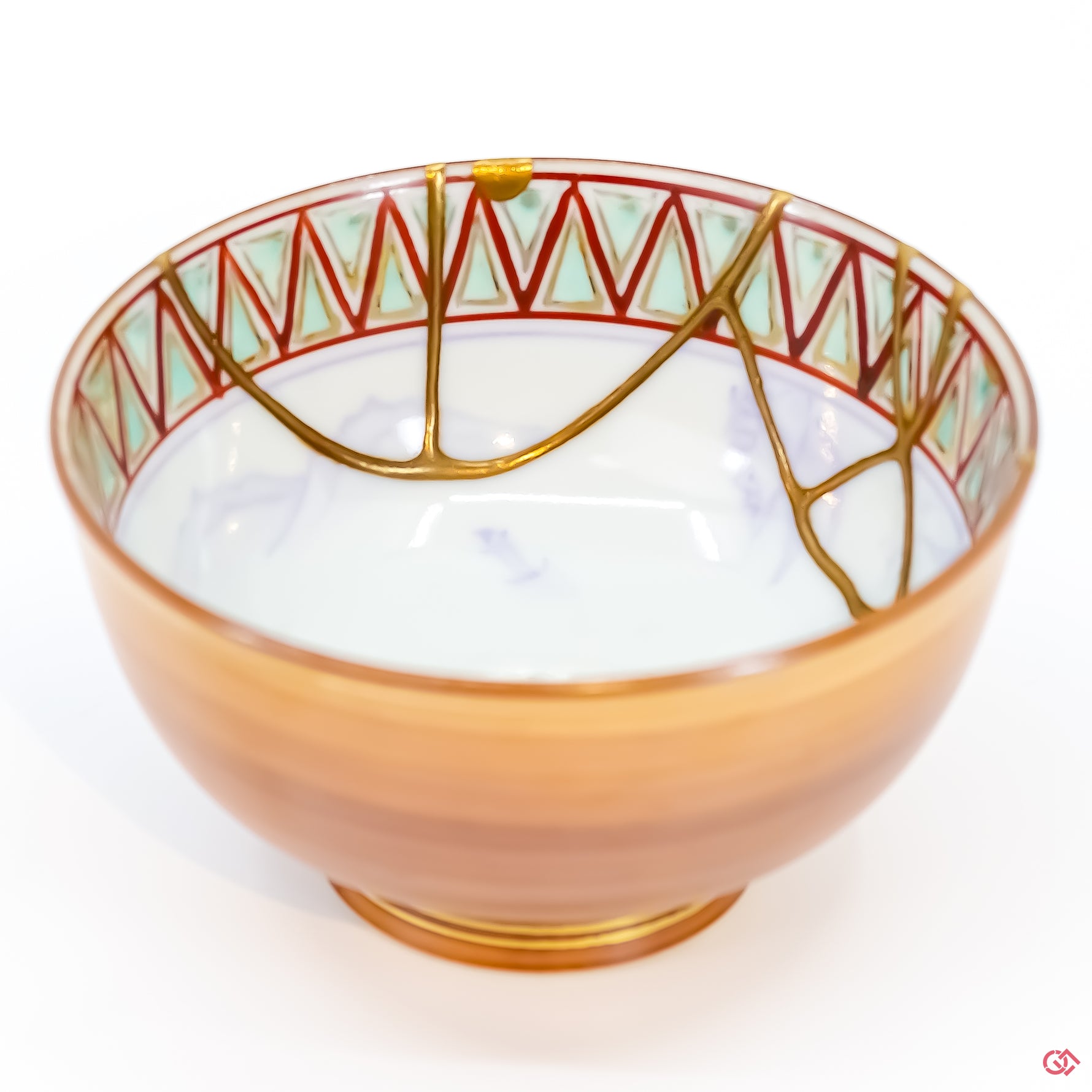 Buy the Japanese art of Kintsugi up close: Witness the delicate brushstrokes of gold that transform imperfection into beauty.