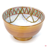 Buy the Japanese art of Kintsugi up close: Witness the delicate brushstrokes of gold that transform imperfection into beauty.