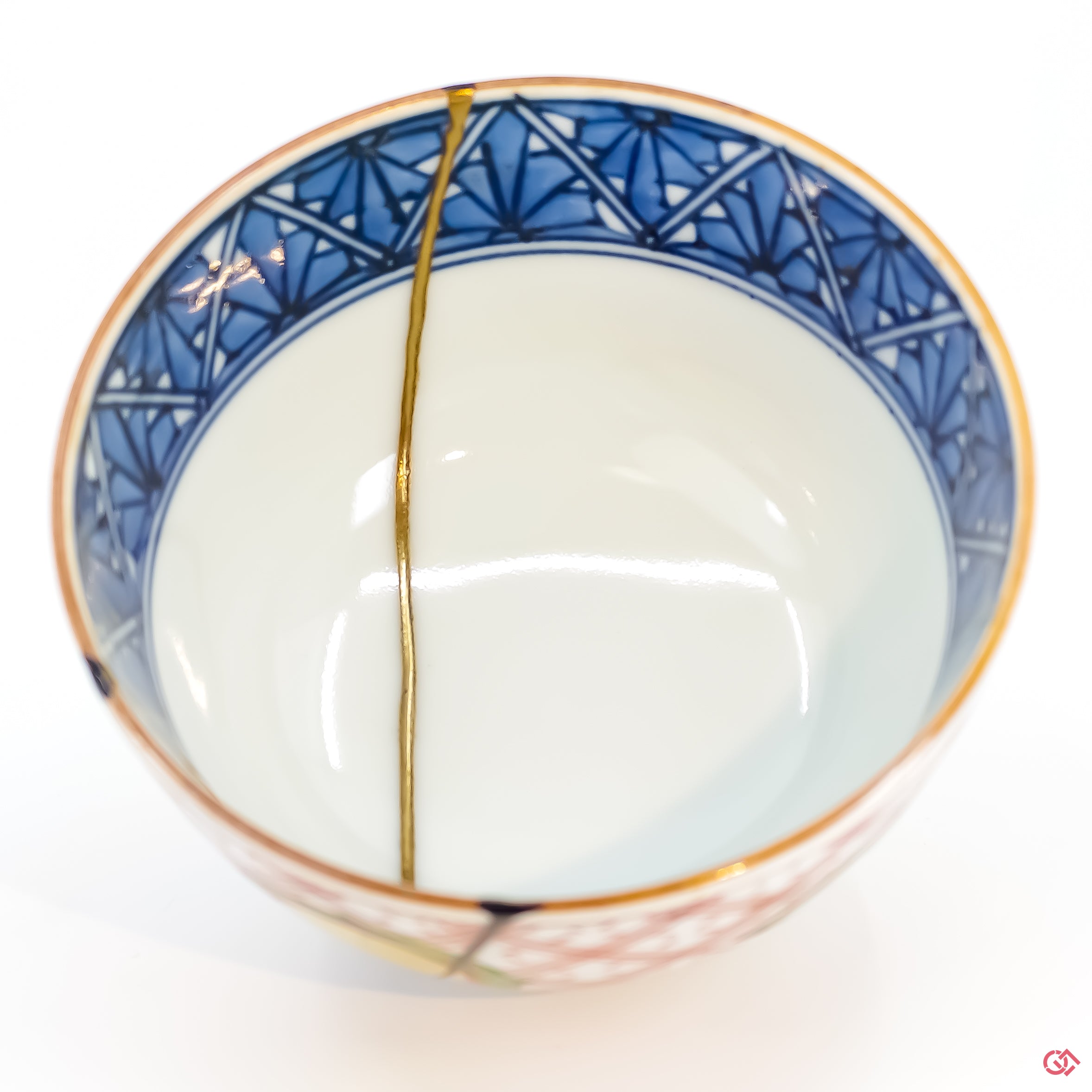 Buy the Japanese art of Kintsugi up close: Witness the delicate brushstrokes of gold that transform imperfection into beauty.