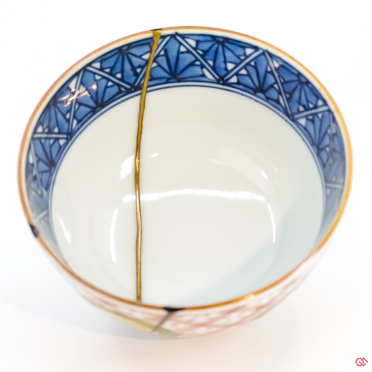 Buy the Japanese art of Kintsugi up close: Witness the delicate brushstrokes of gold that transform imperfection into beauty.