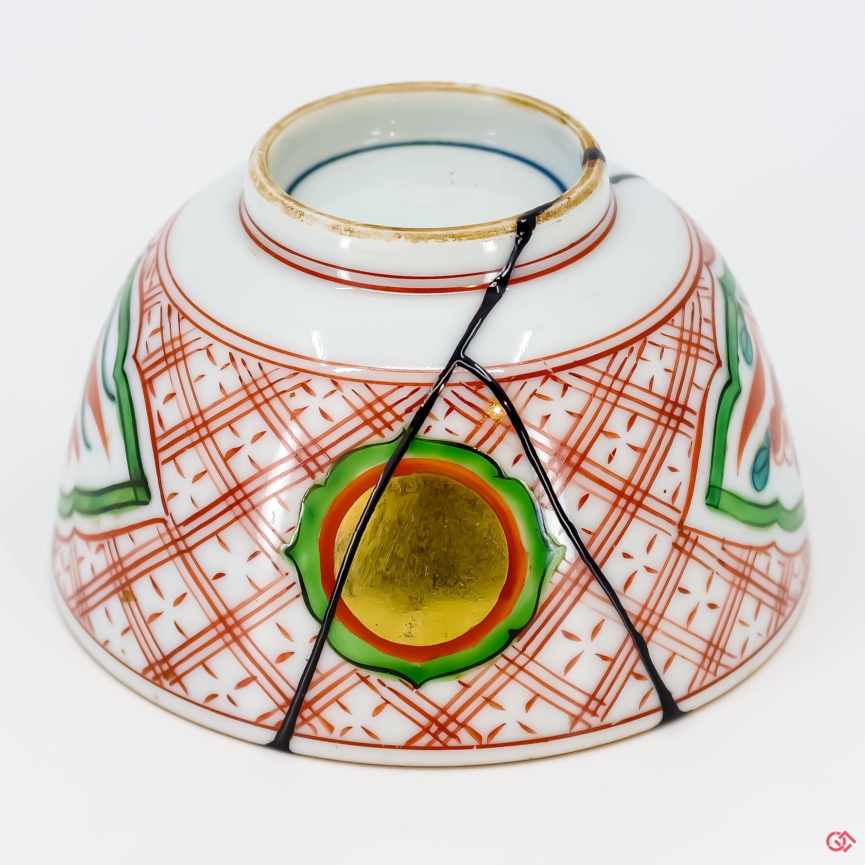 Buy the Japanese art of Kintsugi up close: Witness the delicate brushstrokes of gold that transform imperfection into beauty.