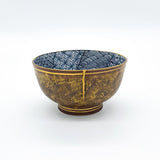 Authentic kintsugi sake cup Mon Pattern with traditional crest design and 24K gold repair — elegant and timeless kintsugi tableware, praised by a returning customer from Texas.