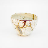 Authentic kintsugi Shigaraki ware cafe cup Crystal Red with warm red speckled glaze and 24K gold repair — beautiful Shigaraki ware tea cup with fast delivery, praised by a returning customer from Basel Switzerland.