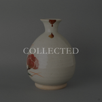 Kyoto ware tokkuri restored with vermilion iro-urushitsugi kintsugi and a 24K gold maki-e droplet, front view. Collected.