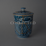 Kyoto ware lidded tea cup restored by kintsugi with urushi and 24K gold, sometsuke shonzui panels and sansui band, shown with the collected badge. Collected.