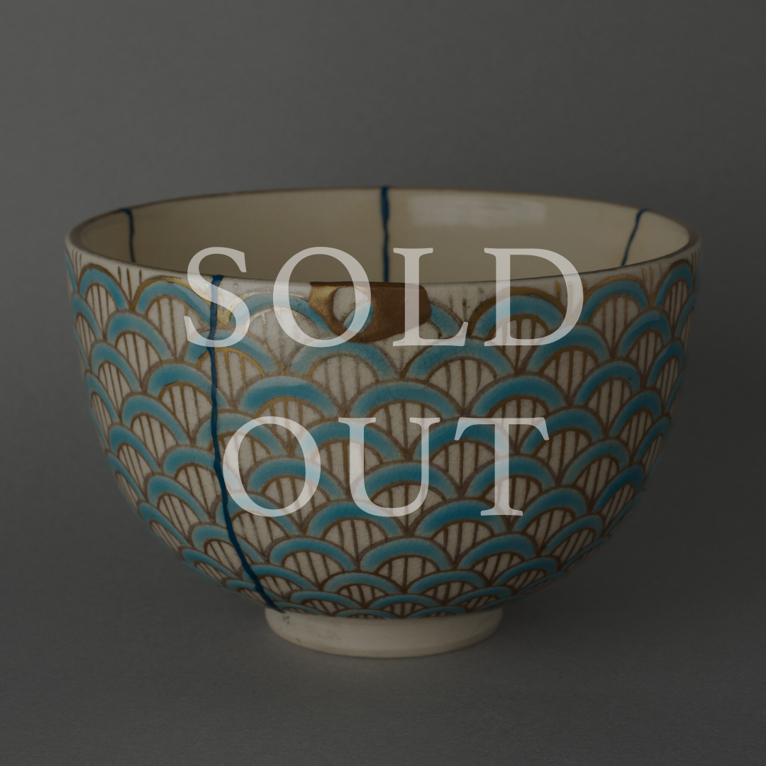 Authentic Japanese Kintsugi Kyoto ware seigaiha pattern tea bowl, hand restored with natural urushi lacquer and 24K gold, marked sold out.