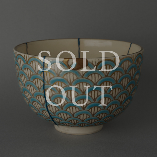 Authentic Japanese Kintsugi Kyoto ware seigaiha pattern tea bowl, hand restored with natural urushi lacquer and 24K gold, marked sold out.