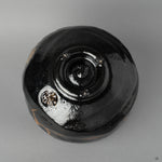 Alternate bottom angle of a Kyoto matcha bowl with kintsugi restoration, each seam holding history made visible.