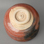 Bottom view of the Kyoto ware bowl, showing the artisan's mark and kintsugi seam, a sign of cultural heritage and authentic craftsmanship.