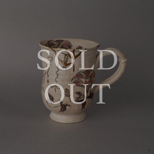 Sold out: kintsugi Kyoto ware mug with 24K gold seams over hand-painted morning glory blossoms and an inscribed waka verse.
