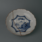 Sold out: Ko-Imari kintsugi plate, a single 24K gold seam crossing a hand-painted cobalt landscape on white porcelain.