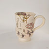 This Kyoto mug turns gently, kintsugi seams in 24K gold appearing and receding, tactile history revealed in motion.