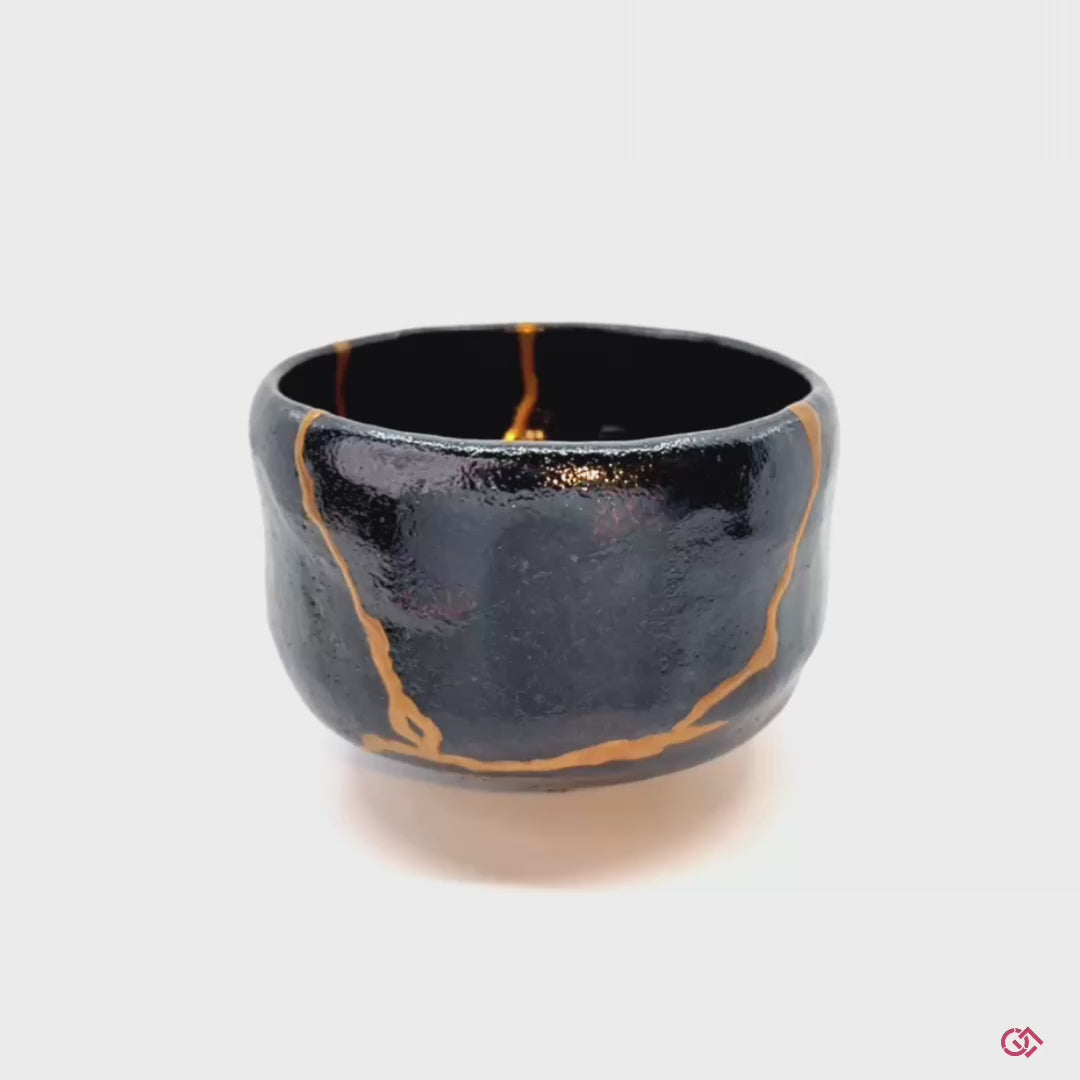 Witness the transformation: Rotating video of broken pottery reborn through authentic kintsugi technique.