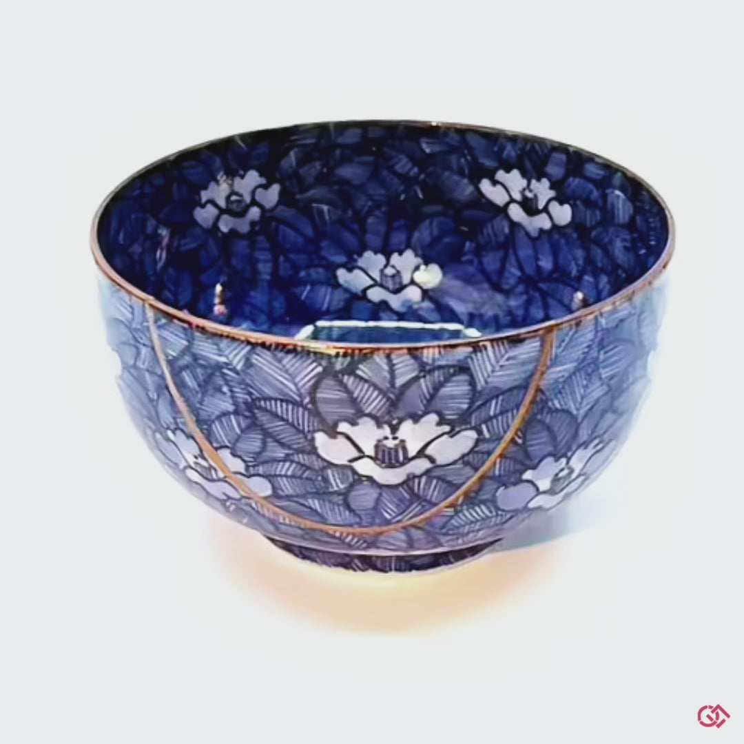 Embrace the beauty of brokenness: This rotating video of an authentic  Kintsugi pottery invites you to discover the captivating elegance of flaws transformed into art.