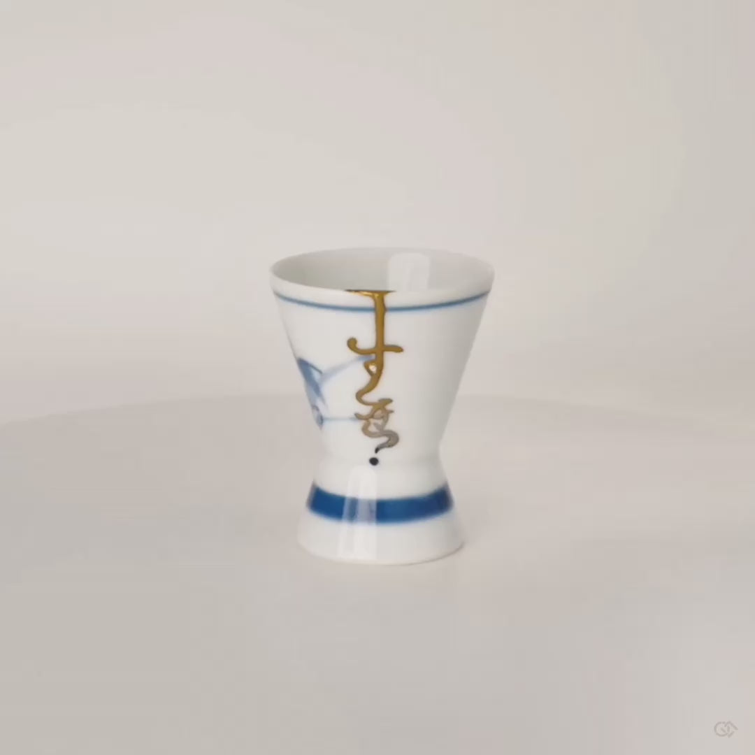360-degree rotation of a kintsugi Ko-Imari sake cup, gold and eggshell inlay turning against grey, enduring legacy.