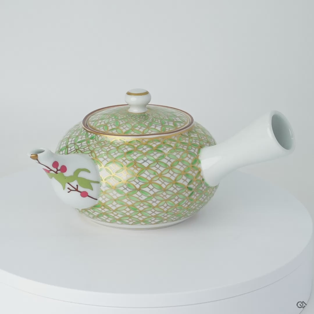 Rotating view of a Kyoto ware teapot in white porcelain with a gold and green shippo pattern and 24K gold kintsugi on the spout, turning to show the full restoration.