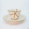 A 360-degree turntable video of the kintsugi cup and saucer, allowing a complete view of the golden seams and its elegant form.