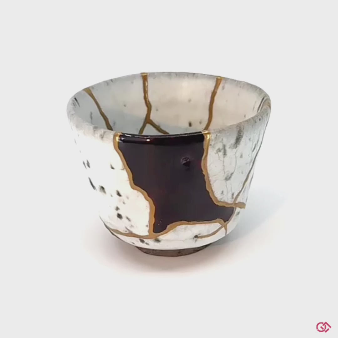 Rotating video of an authentic Kintsugi pottery piece, allowing viewers to see the piece from all angles