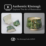 Work-scene video of an Oribe sake cup being restored by kintsugi with natural urushi and 24K gold in the studio, from fragments to finished seams.