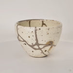 360-degree rotation of silver kintsugi Shigaraki cup revealing branching seams from every angle, living philosophy