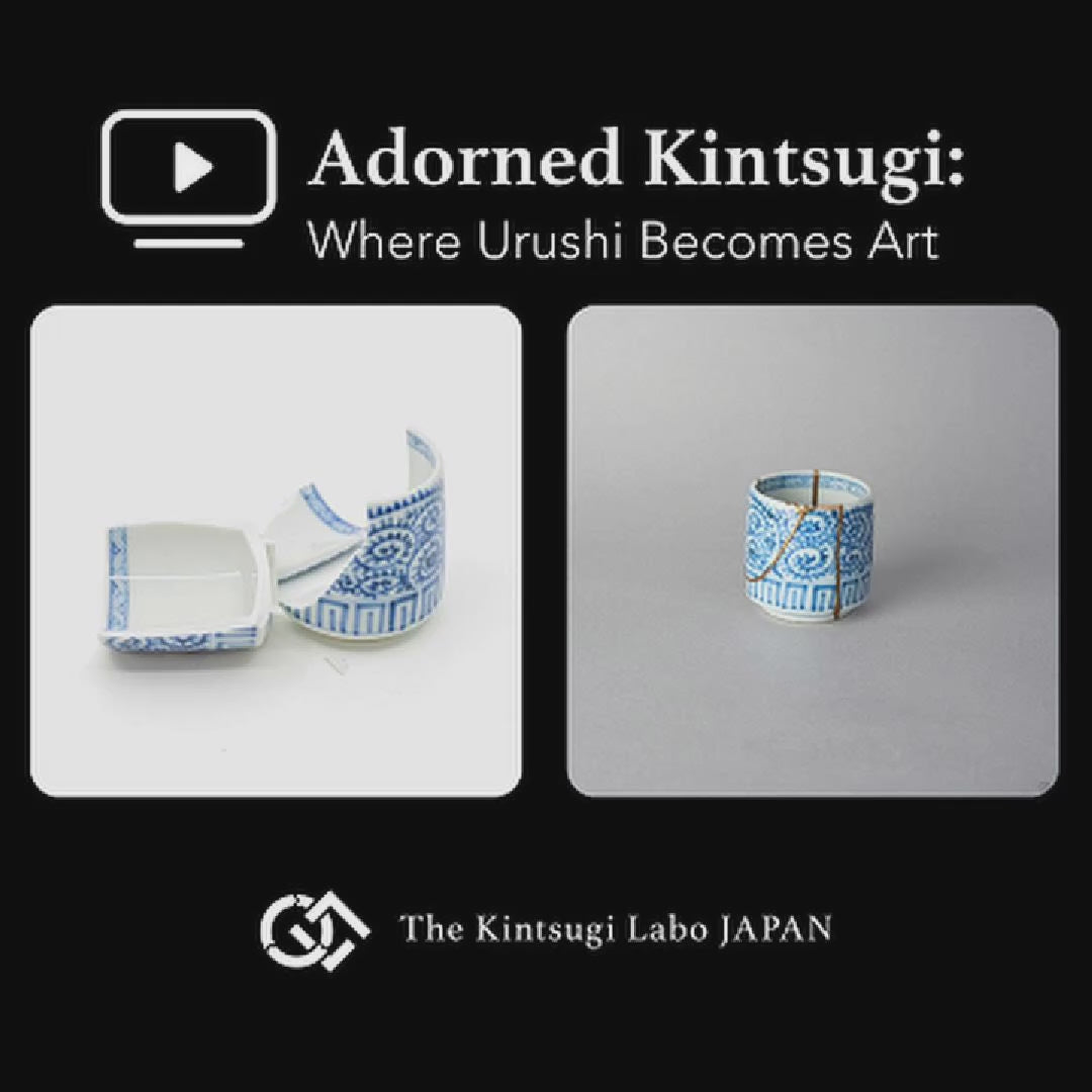 A lacquer artist restoring a Ko-Imari sake cup with 100% natural urushi and 24K gold, showing the kintsugi and lacquer decoration process in the studio in Japan.