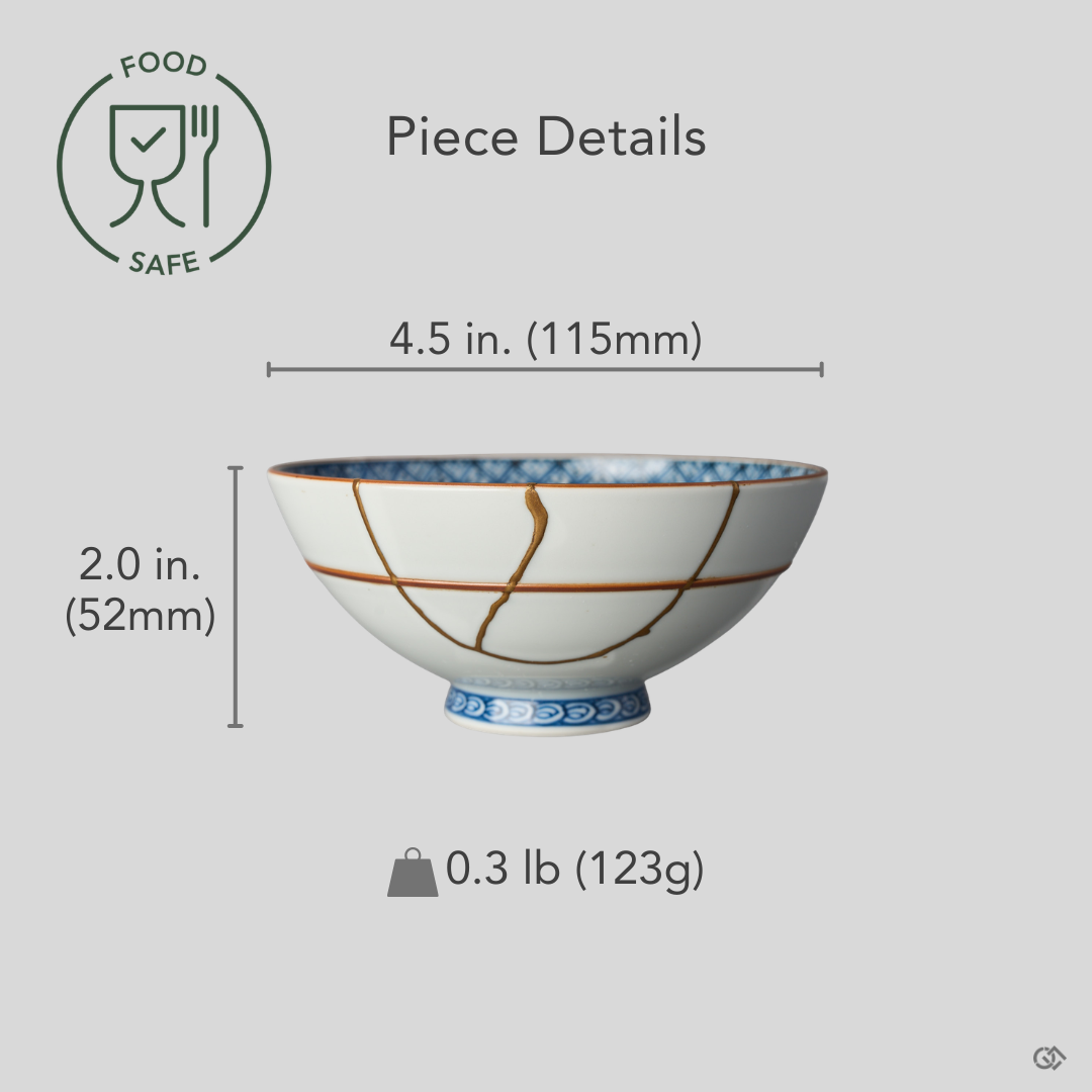 Size reference for a food-safe kintsugi Kyoto ware rice bowl in white porcelain restored with natural urushi and 24K gold: 4.5 in. wide, 2.0 in. tall, 0.3 lb.